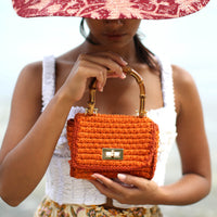 AIRMAIL Petit sac à main au crochet en rose et rouge