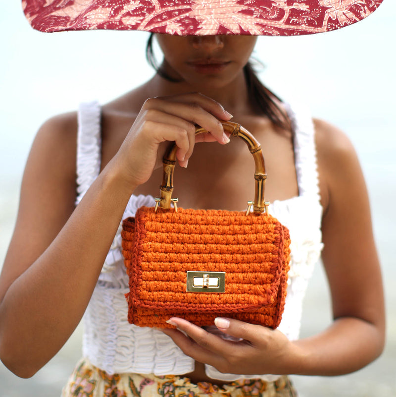 AIRMAIL Petit sac à main au crochet en rose et rouge