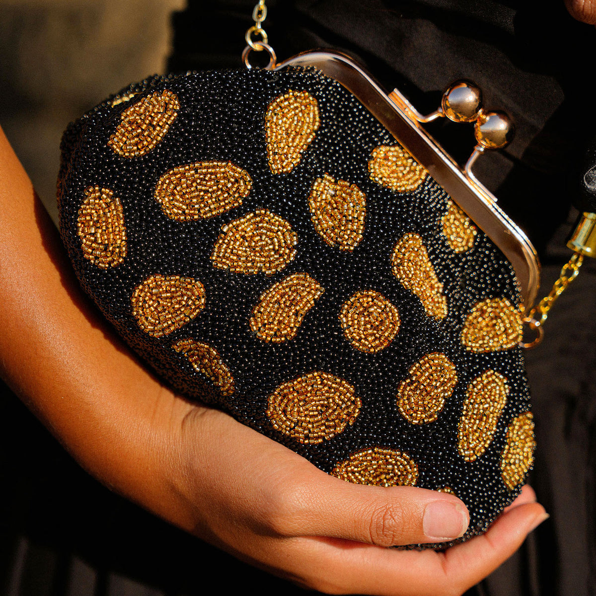 Artisanal Handbeaded Party Clutch Bag in Black and Gold Polka Dot Animal Motif Color Handmade In Bali
