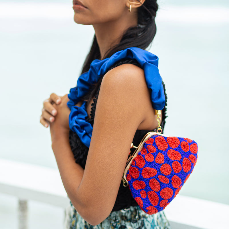 BrunnaCo Arnoldi Mandy Beaded Polka Dot clutch bag in Red and Blue