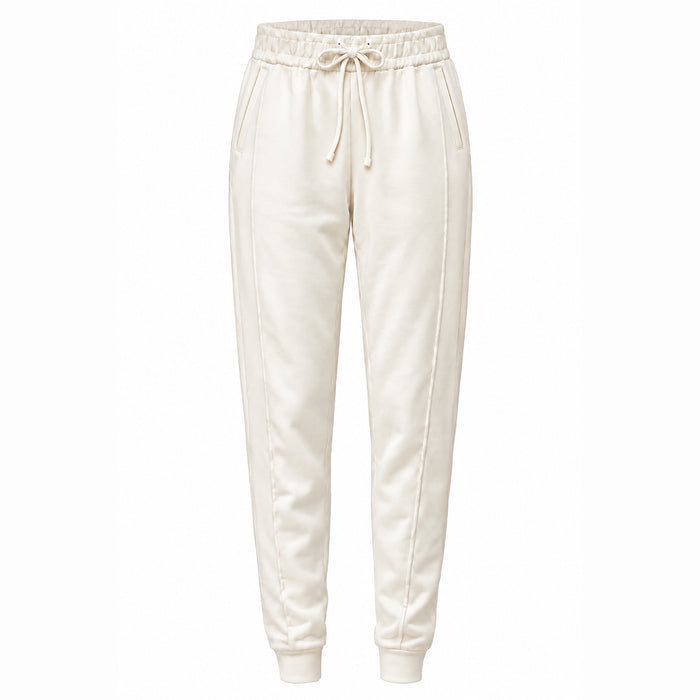Cream-colored jogger sweatpants with an elastic waistband, drawstring, and side pockets, shown against a plain white background.