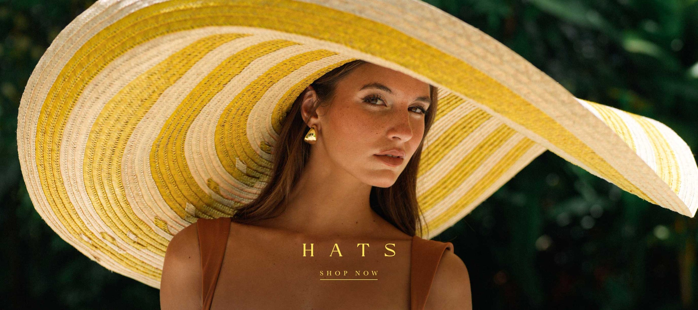 Rachelle Van Waardhuizen wearing  Solana oversized striped straw sun hat, styled for women’s summer hats, resort wear, beach vacation accessories, and luxury sun protection.