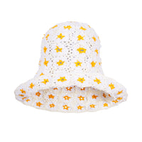 Flora Daisies Crochet Beanie Hat in Off White. This gorgeous crochet hat made from 100% cotton yarn, complete with an eye-catching flower pattern, is designed to give you a fun and feminine fit.  A must-have collection for creating a cute and casual look. Hand-crocheted with love by our female artisans from their very own home in Bali.