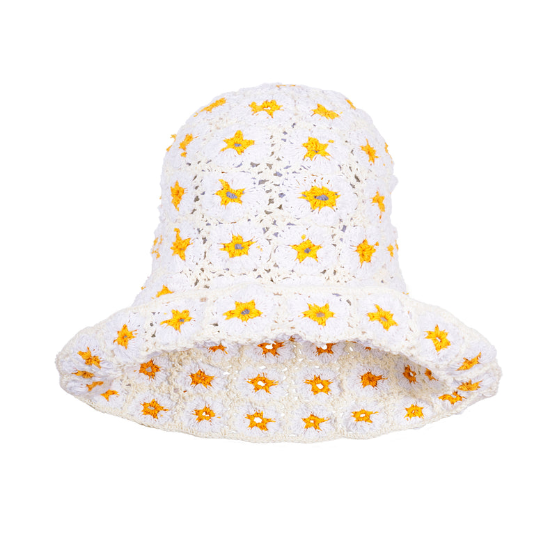 Flora Daisies Crochet Beanie Hat in Off White. This gorgeous crochet hat made from 100% cotton yarn, complete with an eye-catching flower pattern, is designed to give you a fun and feminine fit.  A must-have collection for creating a cute and casual look. Hand-crocheted with love by our female artisans from their very own home in Bali.