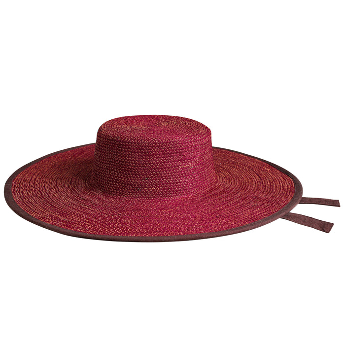 Inka Williams wears BrunnaCo's Burgundy Lolo Jute Hat in a Bali photoshoot. Handwoven by Balinese artisans, this piece beautifully combines sustainable craftsmanship with the effortless charm of California style.