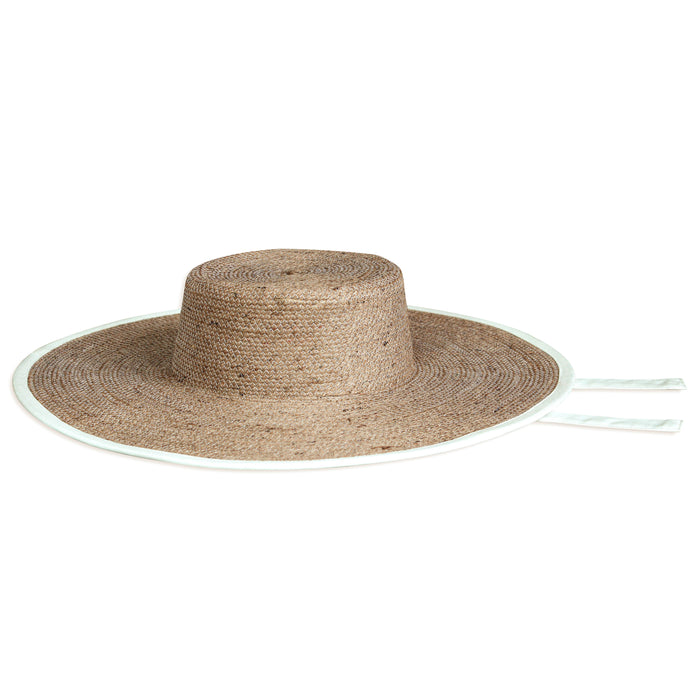 Inka Williams wears BrunnaCo's Beige Lolo Jute Hat in a Bali photoshoot. Handwoven by Balinese artisans, this piece beautifully combines sustainable craftsmanship with the effortless charm of California style.