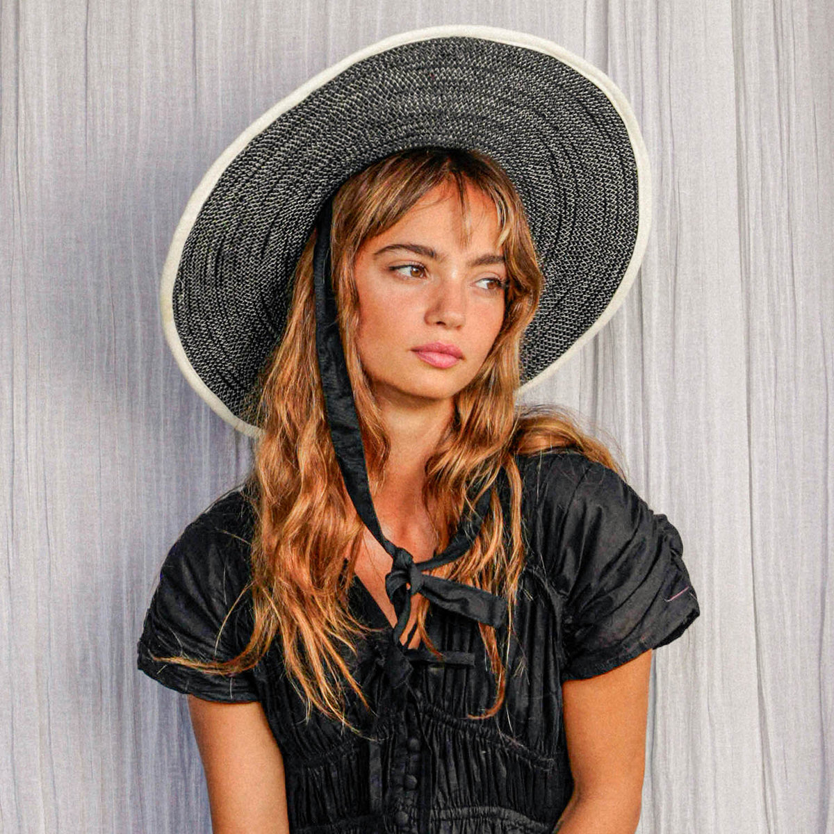 The Lolo Wide-brim Jute Boater Hat in Black