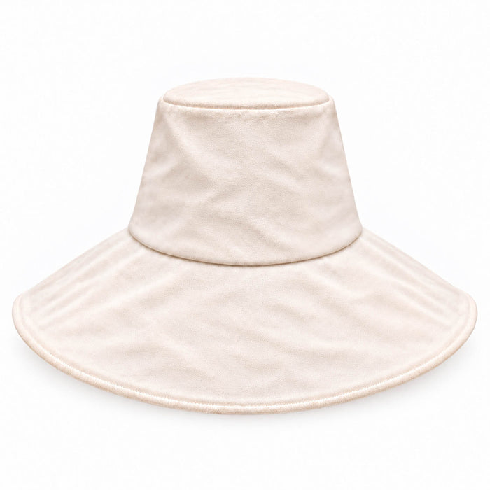A light cream-colored wide-brim packable canvas sun hat with a soft, plush texture, shown against a plain white background.