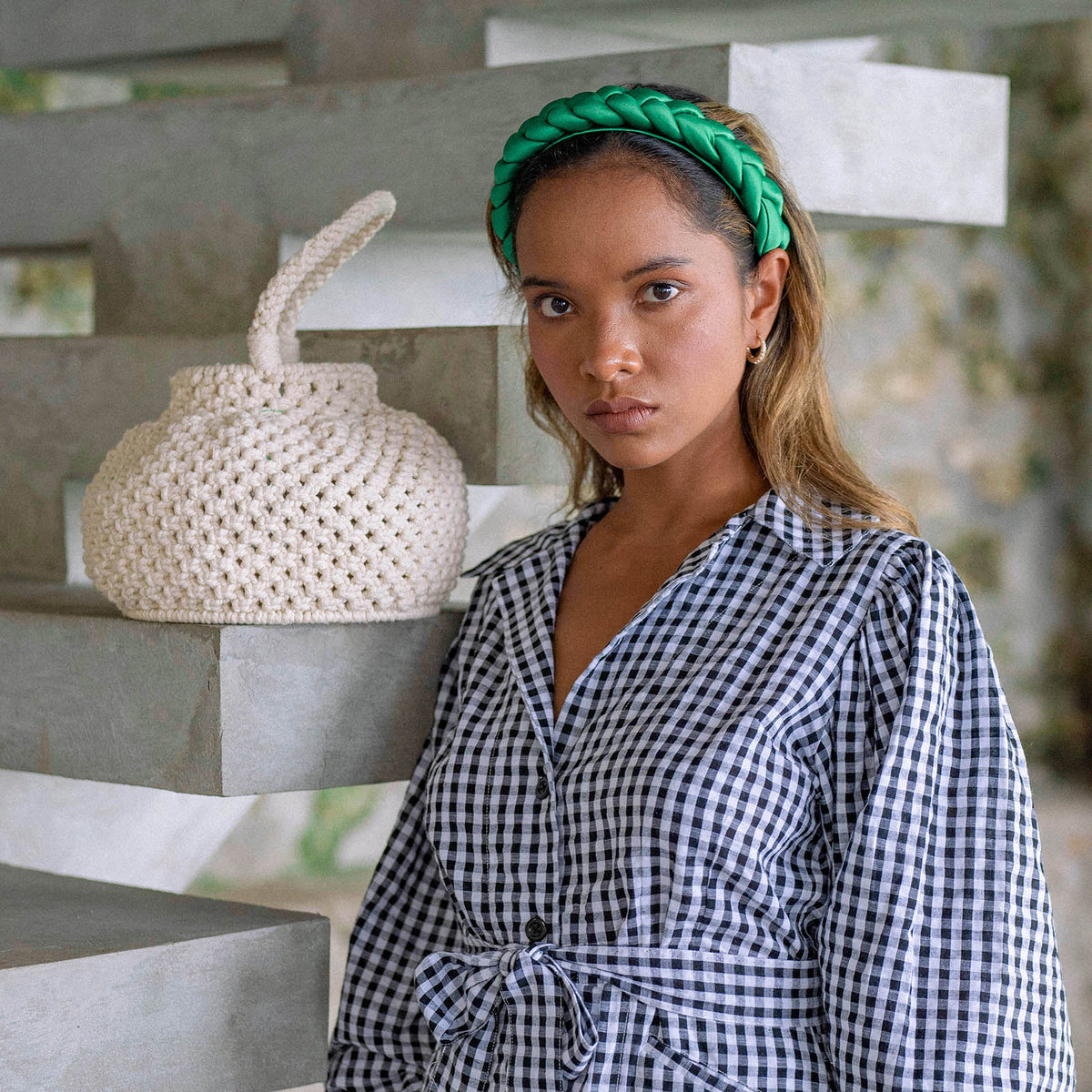 Naga Macrame Beach Bucket Bag. A stylish and eco-friendly macrame beach bag by BrunnaCo, featuring intricate woven patterns, durable handles, and spacious interior, perfect for carrying your beach essentials in sustainable style