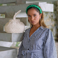 Naga Macrame Beach Bucket Bag. A stylish and eco-friendly macrame beach bag by BrunnaCo, featuring intricate woven patterns, durable handles, and spacious interior, perfect for carrying your beach essentials in sustainable style