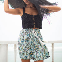 SEKAR Floral Batik Shorts in Sea blue  is made entirely from a relaxed, lightweight cotton fabric fit for every warm-weather destination. With the drawstring waist, wear SEKAR both low and high-rise. As seen on our lookbook, style SEKAR with our MARIGOLD Hand-embroidered Bralette Top and AMORA Frayed Straw Hat.