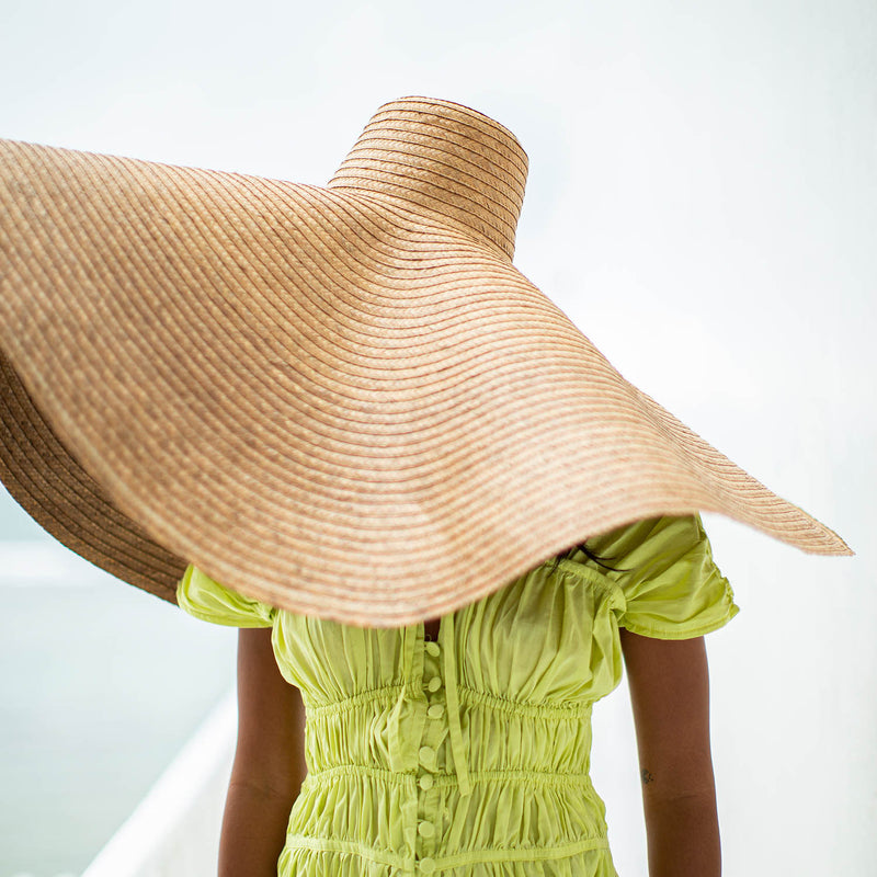SOLANA Oversized Wide-brim Straw Beach, Pool and Vacation Hat In Toasted Beige Styled With Lime Green Srikandi Ruffled Dress