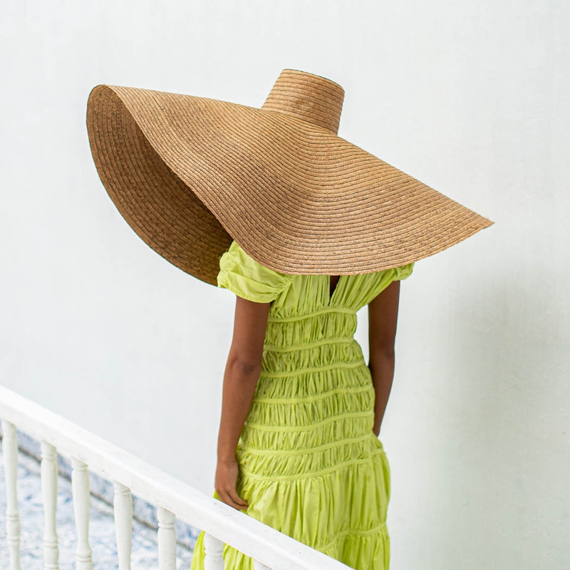 SOLANA Oversized Wide-brim Straw Beach, Pool and Vacation Hat In Toasted Beige Styled With Lime Green Srikandi Ruffled Dress