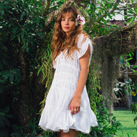Inka Williams is wearing BrunnaCo's White Lotus Srikandi Resort Dress in a beautiful lush green desa home in Bali