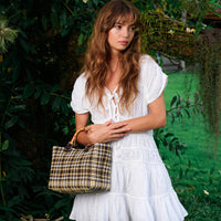 Inka Williams is wearing BrunnaCo's White Lotus Srikandi Resort Dress in a beautiful lush green desa home in Bali