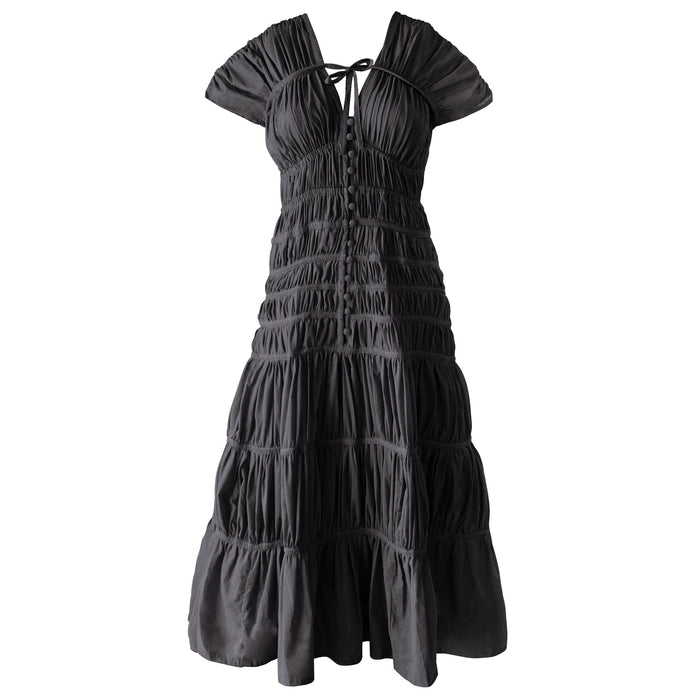 Inka Williams is wearing BrunnaCo's Black Srikandi Ruffle Dress in a photoshoot in Bali. The dress is handmade by artisans in Bali, designed with Californian flair.