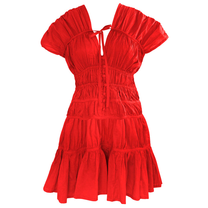 Inka Williams wears BrunnaCo's Red Srikandi Ruffle Dress for a Bali photoshoot. Handmade by Balinese artisans, the dress blends traditional craftsmanship with effortless California flair.