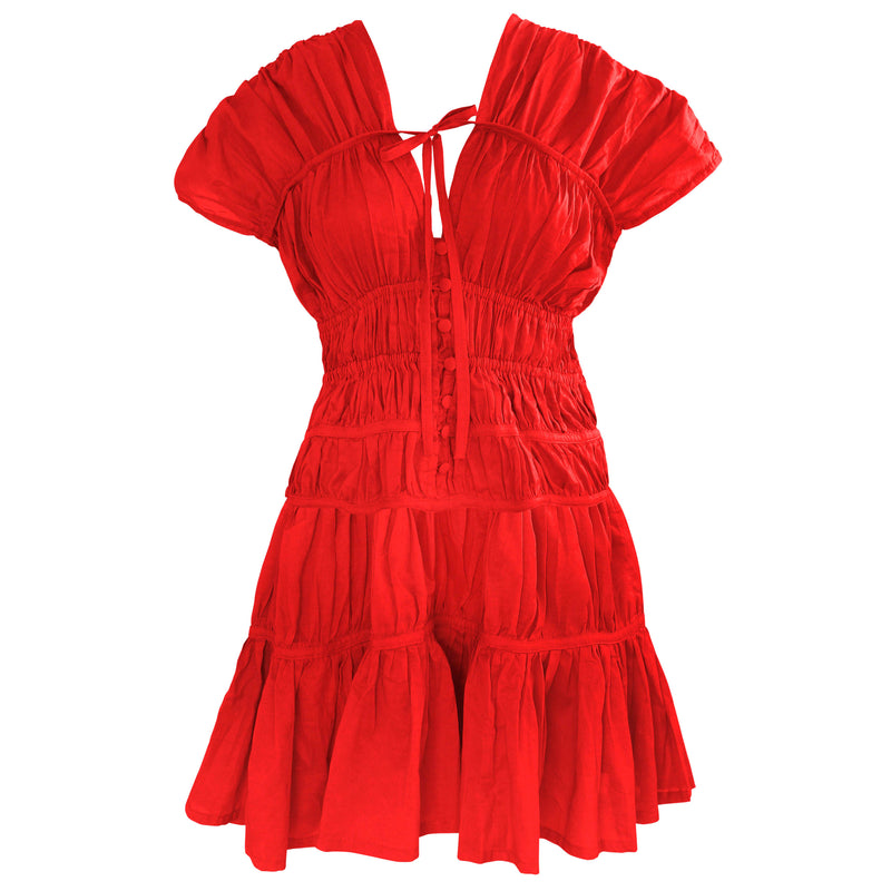 Inka Williams wears BrunnaCo's Red Srikandi Ruffle Dress for a Bali photoshoot. Handmade by Balinese artisans, the dress blends traditional craftsmanship with effortless California flair.