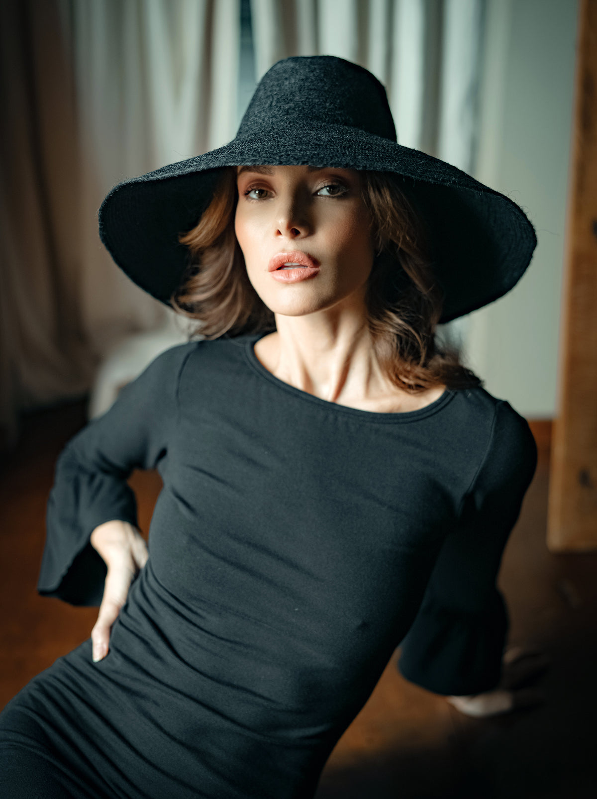 Don't be afraid of the sun. Step out in confidence with this ultra-comfortable Riri Jute woven sun hat in black. Take this artisanal hat everywhere from the sunny beachside to the hot savanna of your choice and enjoy full-on protection under the sun, while still keeping in style. This sustainable resort vacation straw hat is uniquely made by artisans in Bali.