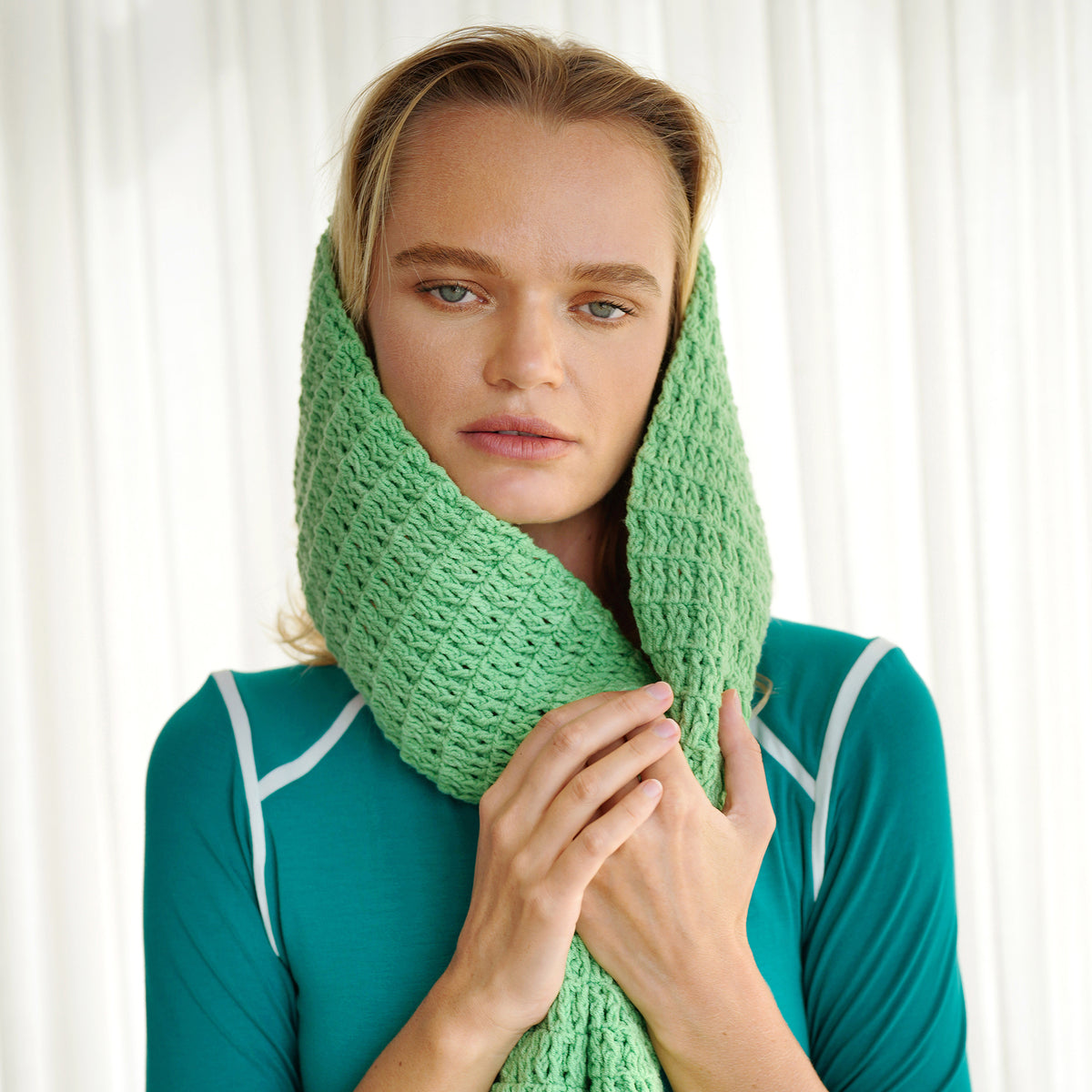 BrunnaCo's WAFFLE Crochet Scarf in sage green has a cozy and buttery-soft texture that makes you want to wear it everywhere when the temperature gets cold. It's hand-crocheted in waffle pattern with sumptuous cotton yarn by our female artisans in Java who put so much love into this piece. Wrap it around your neck twice or let it drape loosely over the lapels of your coat.